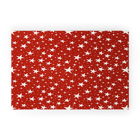 Avenie Christmas Stars in Red Welcome Mat