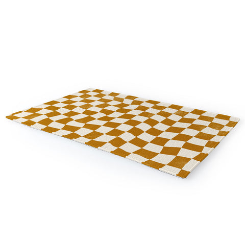 Avenie Warped Checkerboard Gold Area Rug