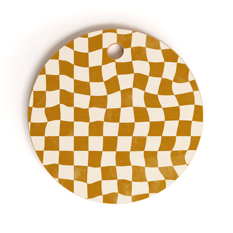 Avenie Warped Checkerboard Gold Cutting Board Round