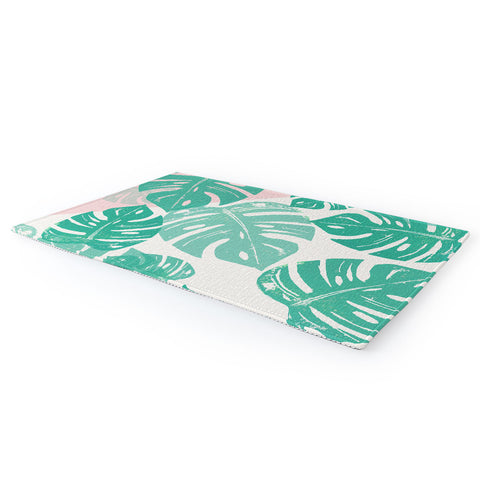 Bianca Green Linocut Monstera Rosy Area Rug