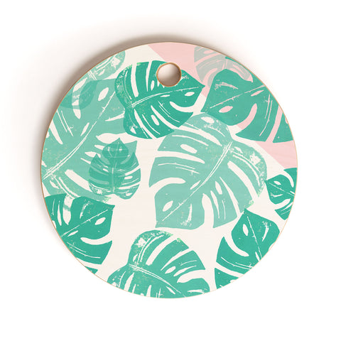 Bianca Green Linocut Monstera Rosy Cutting Board Round