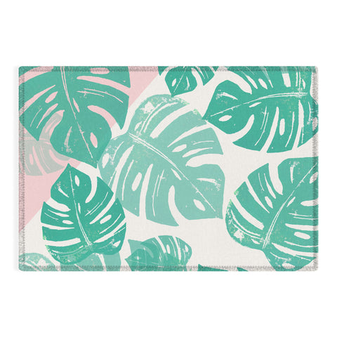 Bianca Green Linocut Monstera Rosy Outdoor Rug