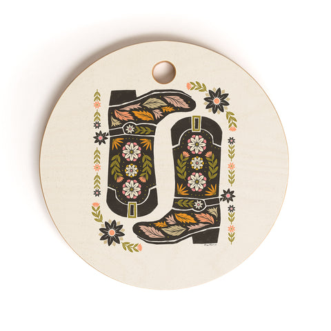 Carey Copeland Cowboy boots and flowers Cutting Board Round