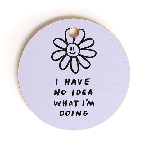 Charly Clements No Idea Daisy in Lilac Cutting Board Round