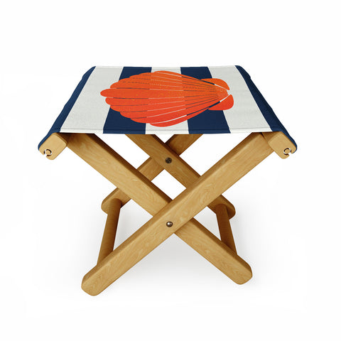 Cynthia Haller Orange clamshell and navy Folding Stool