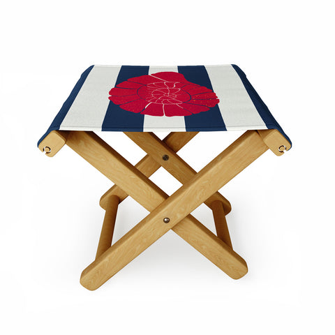 Cynthia Haller Red nautilus shell and navy Folding Stool
