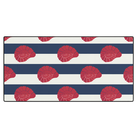 Cynthia Haller Red nautilus shell and navy Desk Mat
