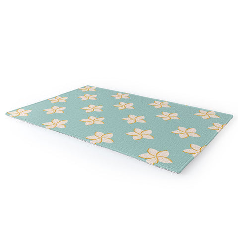 Cynthia Haller White and turquoise plumeria Area Rug