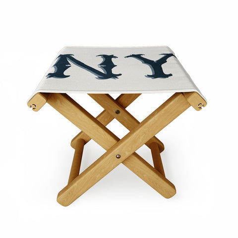 DENY Designs yonkers ny cream Folding Stool