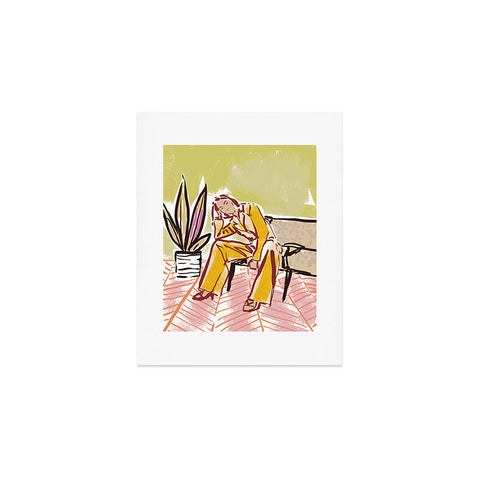 DESIGN dannick Woman sitting on sofa Art Print