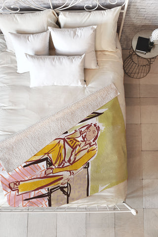 DESIGN d´annick Woman sitting on sofa Fleece Throw Blanket