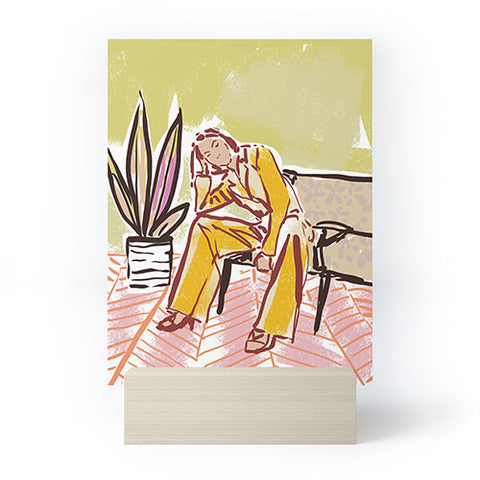 DESIGN d´annick Woman sitting on sofa Mini Art Print