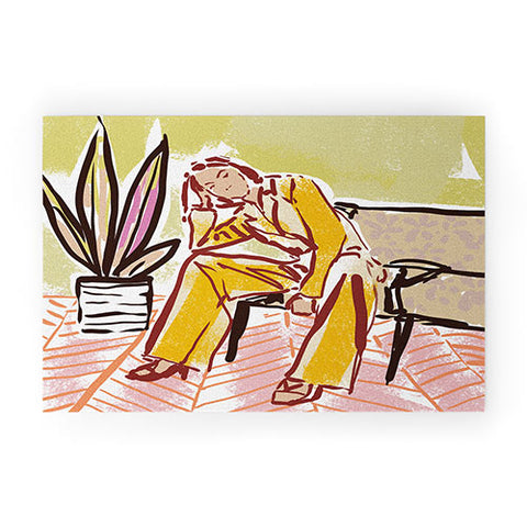 DESIGN dannick Woman sitting on sofa Welcome Mat
