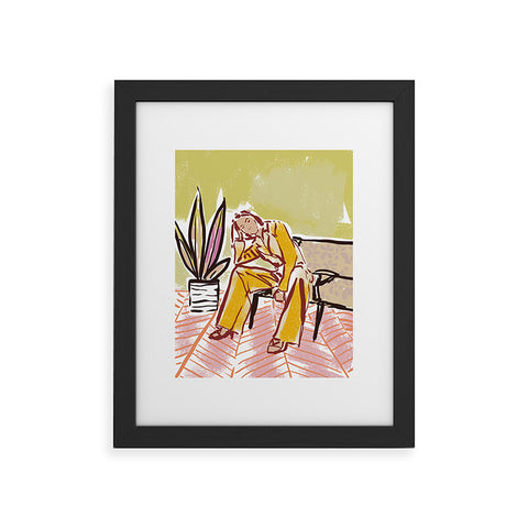 DESIGN dannick Woman sitting on sofa Framed Art Print