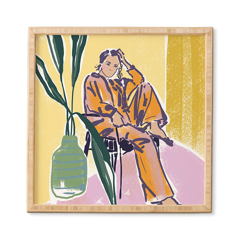DESIGN dannick Woman wearing yellow pajamas Framed Wall Art