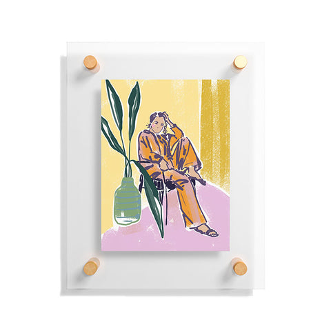 DESIGN d´annick Woman wearing yellow pajamas Floating Acrylic Print