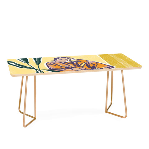 DESIGN d´annick Woman wearing yellow pajamas Coffee Table