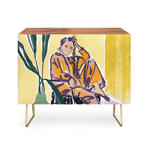 DESIGN d´annick Woman wearing yellow pajamas Credenza