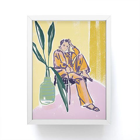 DESIGN d´annick Woman wearing yellow pajamas Framed Mini Art Print