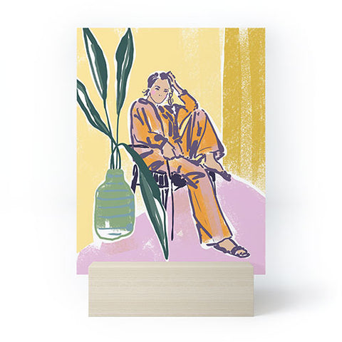 DESIGN d´annick Woman wearing yellow pajamas Mini Art Print