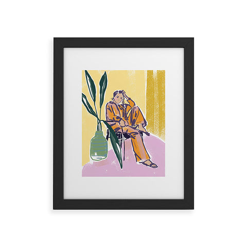 DESIGN dannick Woman wearing yellow pajamas Framed Art Print