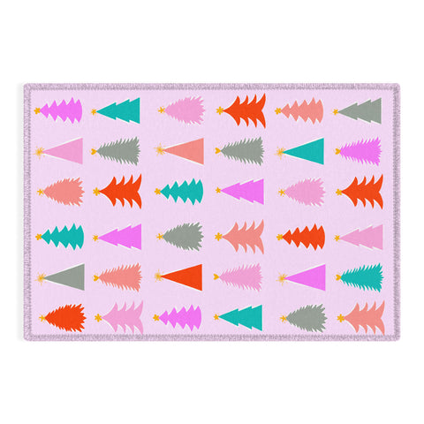Dominique Vari Words Christmas Tree Pattern on Pink Outdoor Rug