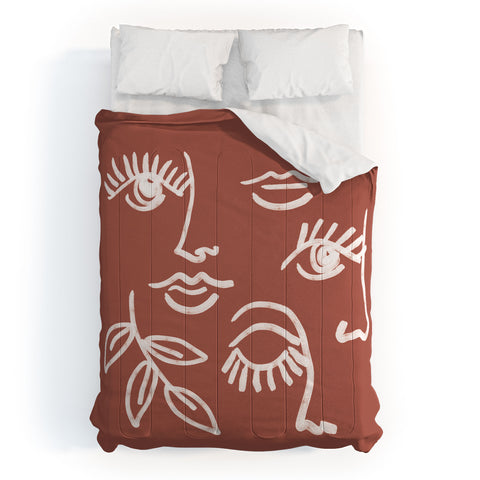 Emanuela Carratoni Line Art Portraits on Brown Comforter