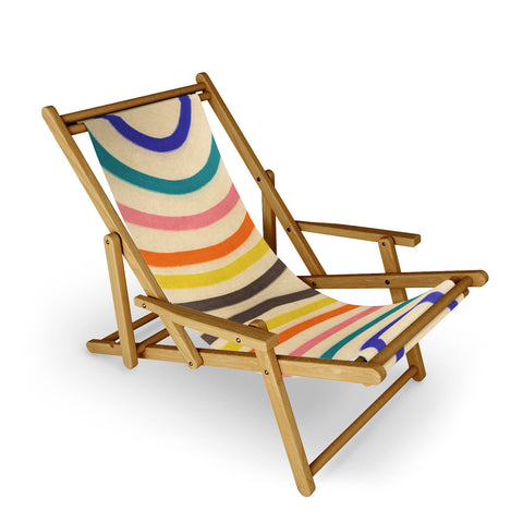 Gigi Rosado Chasing rainbows Sling Chair