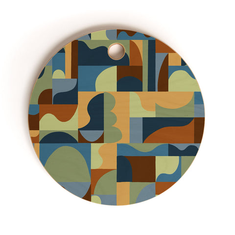 Gigi Rosado Geometric collage forest Cutting Board Round