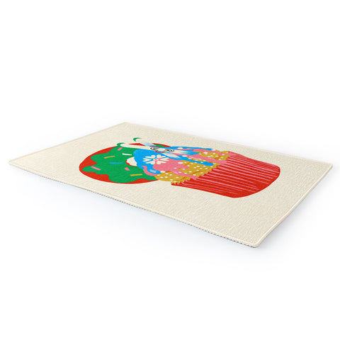 Gigi Rosado Ski cupcake Area Rug