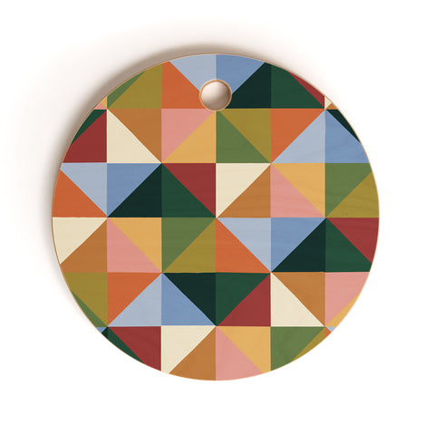 Gigi Rosado Warm triangles Cutting Board Round
