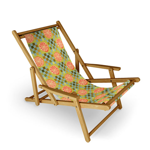 H Miller Ink Illustration Checkered Citrus Fruit in Sage Sling Chair