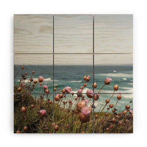 Henrike Schenk - Travel Photography Pink Flowers by the Ocean Wood Wall Mural