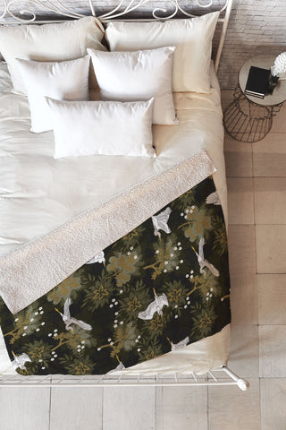 Iveta Abolina Herons over Jungle Fleece Throw Blanket