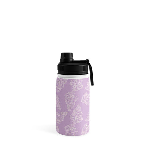 Lathe & Quill Conch Shell on Lavender Water Bottle