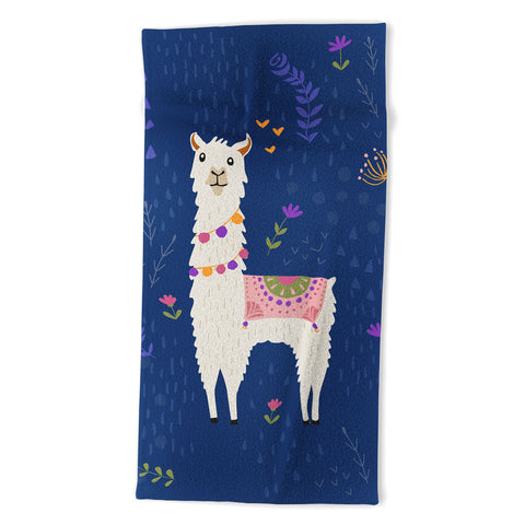 Lathe & Quill Llama on Blue Beach Towel