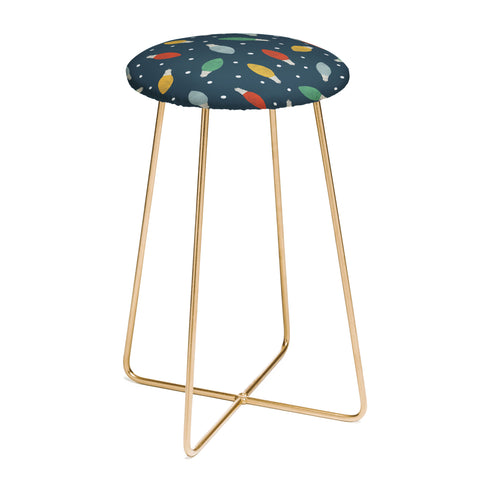 Little Arrow Design Co christmas light on blue Counter Stool