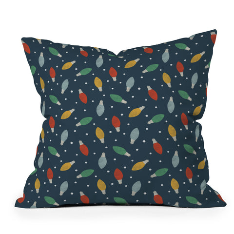 Little Arrow Design Co christmas light on blue Throw Pillow