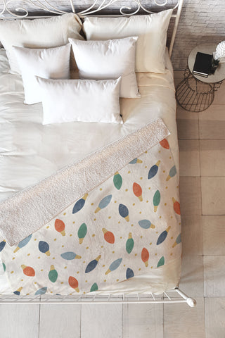 Little Arrow Design Co christmas lights on cream Fleece Throw Blanket