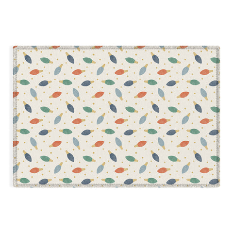 Little Arrow Design Co christmas lights on cream Outdoor Rug