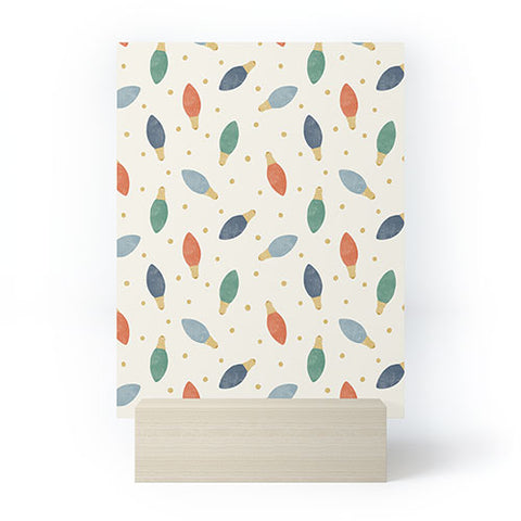 Little Arrow Design Co christmas lights on cream Mini Art Print
