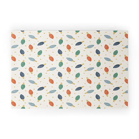 Little Arrow Design Co christmas lights on cream Welcome Mat