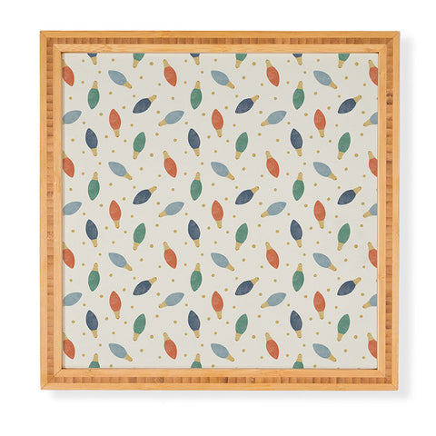 Little Arrow Design Co christmas lights on cream Framed Wall Art