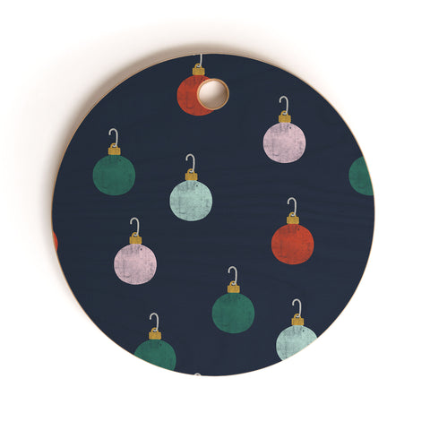 Little Arrow Design Co christmas ornaments on navy Cutting Board Round