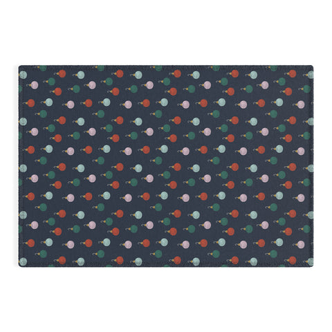 Little Arrow Design Co christmas ornaments on navy Outdoor Rug