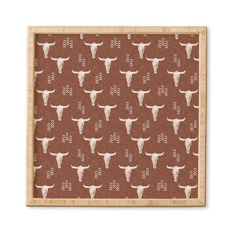 Little Arrow Design Co cow skulls on rust Framed Wall Art