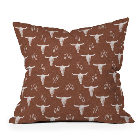 Little Arrow Design Co cow skulls on rust Outdoor Throw Pillow