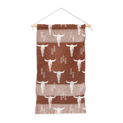 Little Arrow Design Co cow skulls on rust Wall Hanging Portrait