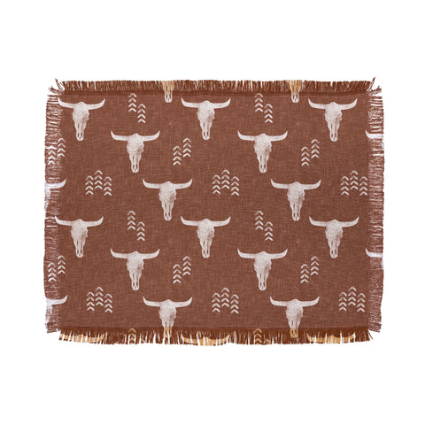 Little Arrow Design Co cow skulls on rust Throw Blanket