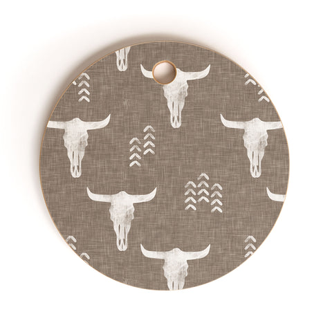 Little Arrow Design Co cow skulls on taupe Cutting Board Round